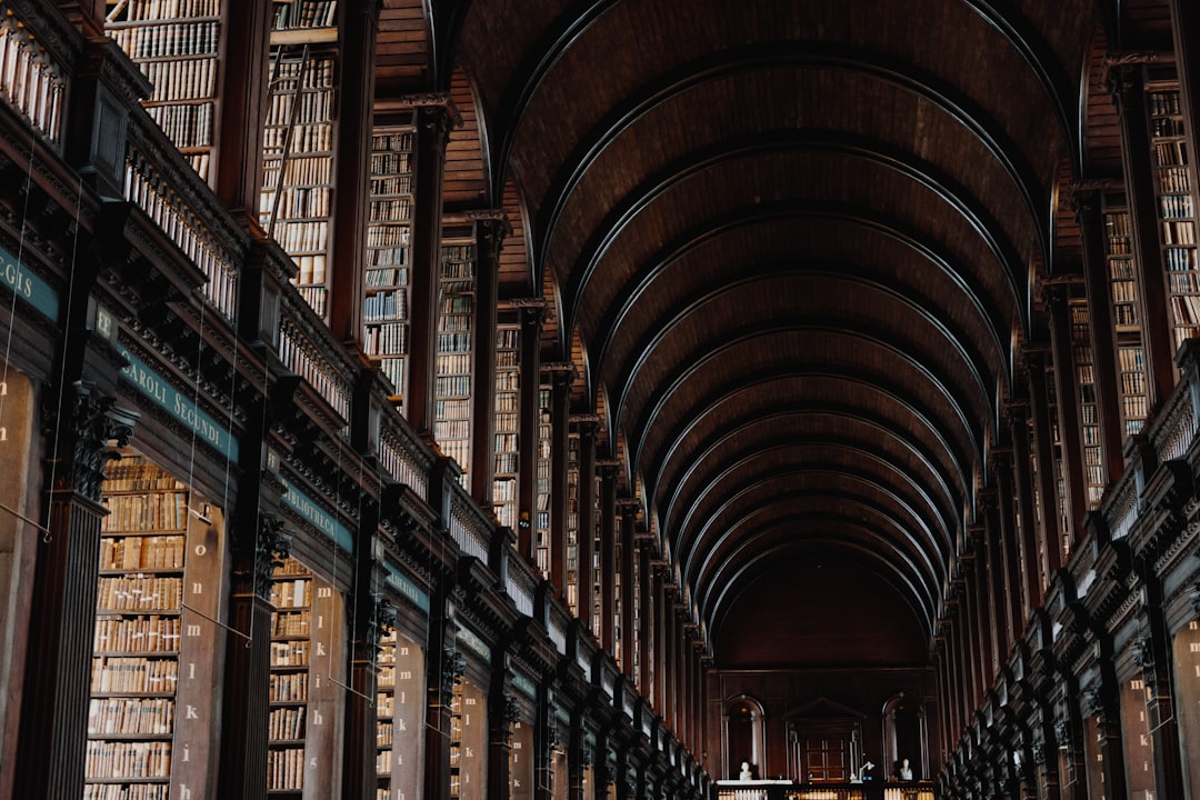 Photo by Giammarco Boscaro landscape photo of library hallway